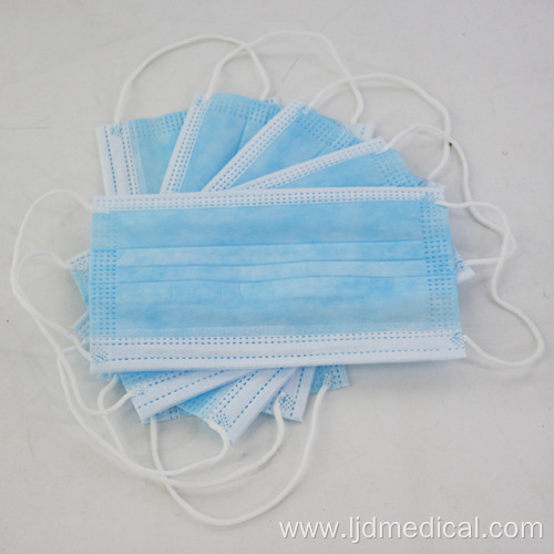 Nonwoven medical surgical mask with earloop